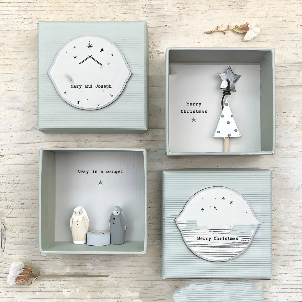 Boxed plastic resin guardian angel ornament in cartoon style for gifting