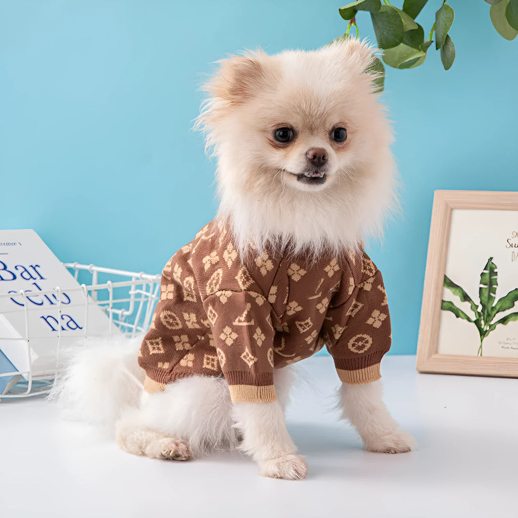A thick wool dog sweater shown in a choice of monochrome or two-tone colours, sized from XS to XXL.