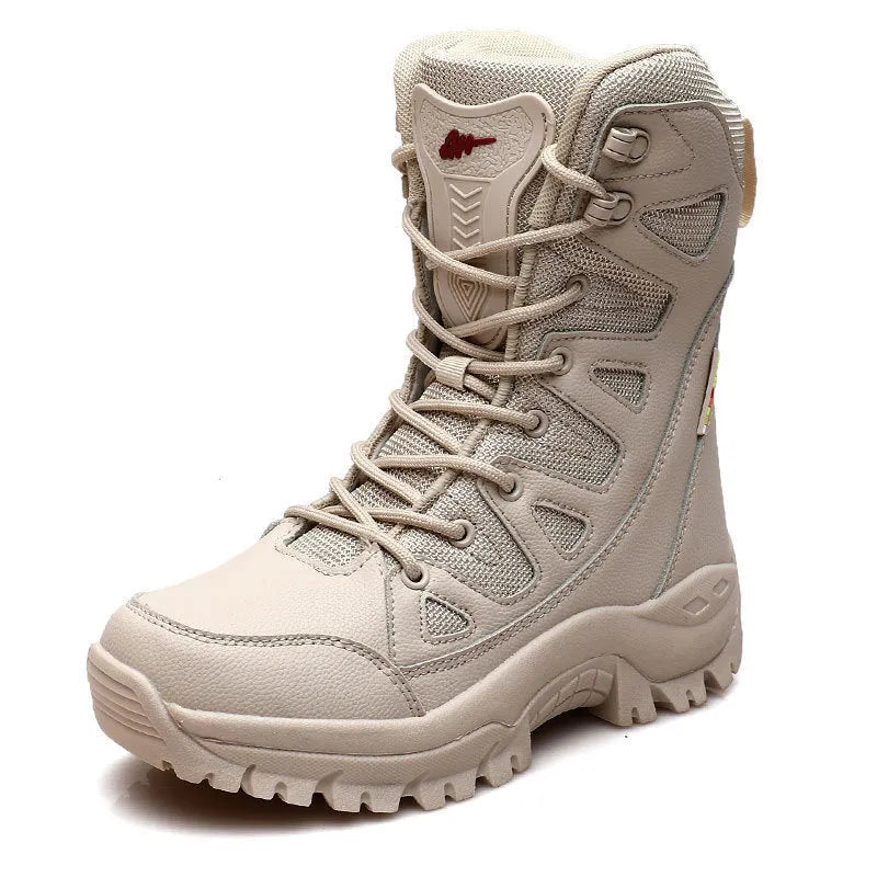 Men's cowhide leather hi-top hiking shoes in beige colour on a rocky outdoor path.