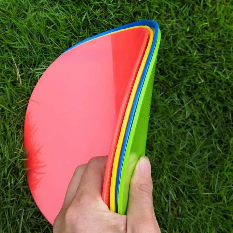 Flat circular TPE football training marker disc in bright colours for field practice.