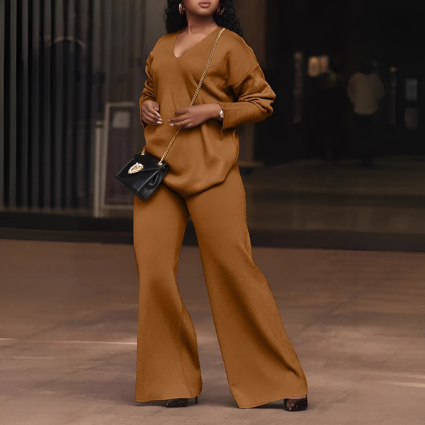 Women's brown suede two-piece suit with split sleeves and trousers