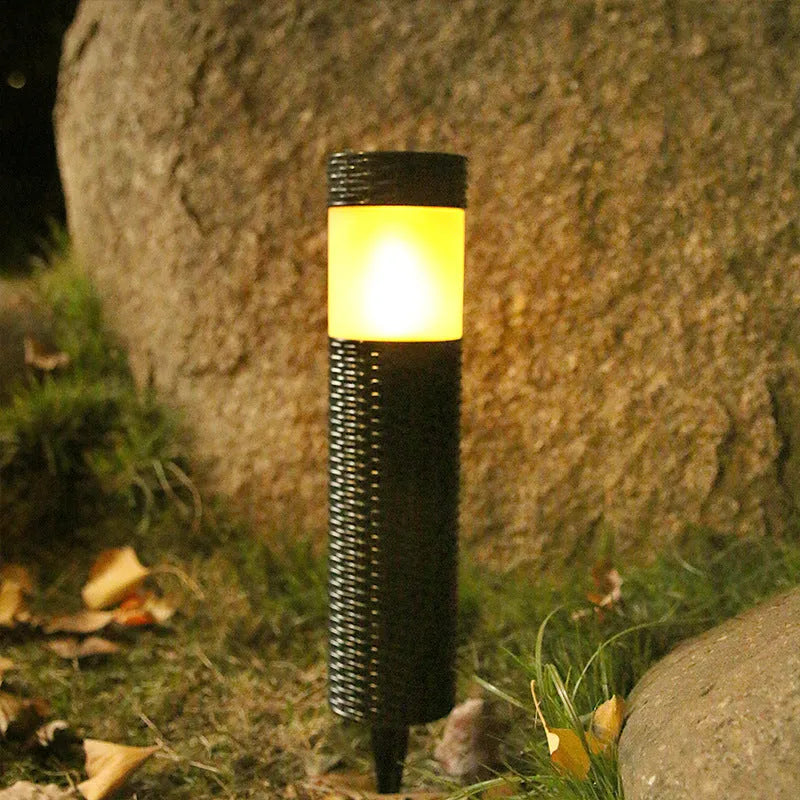 Modern abstract solar-powered outdoor garden light with waterproof casing.