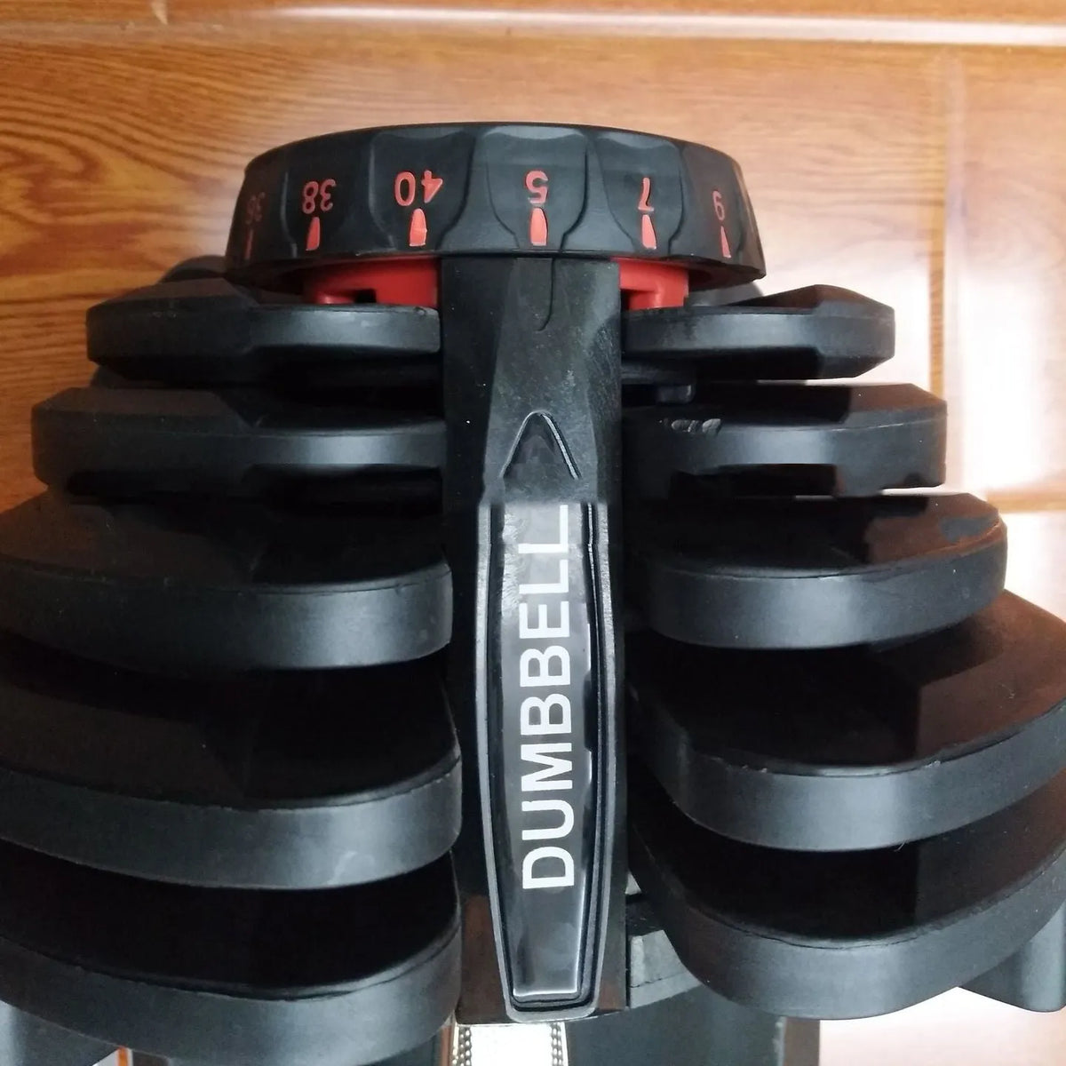 Men's black automatic quick fitness adjustment dumbbell with iron and plastic construction, single unit for home gym