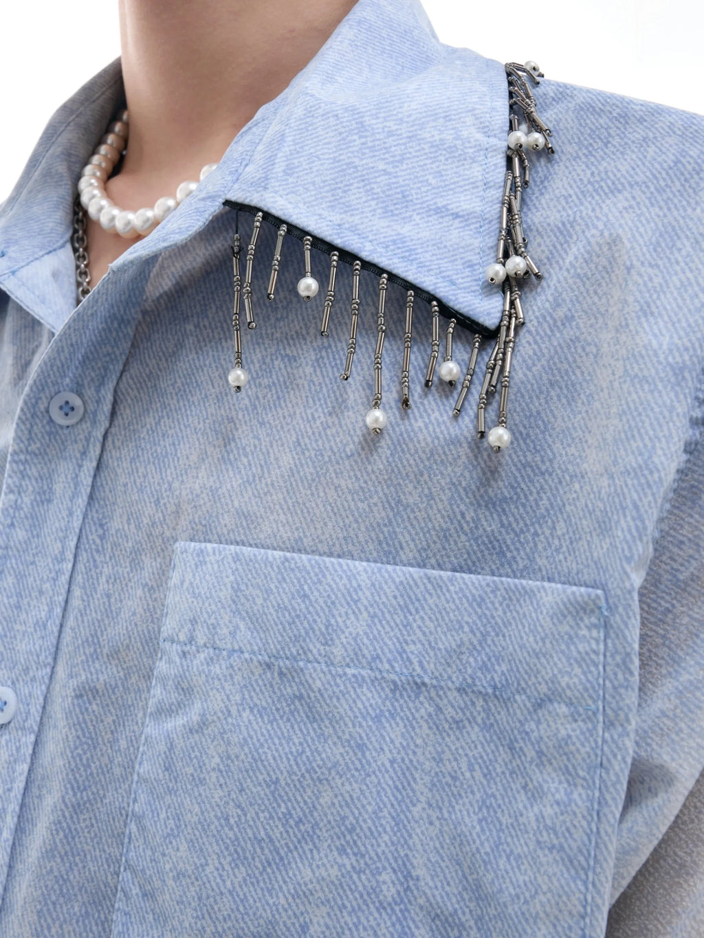 Blue loose fit short sleeve casual shirt on a hanger.