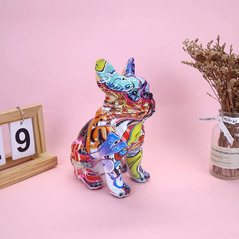 Graffiti-coloured resin French bulldog statue on a shelf