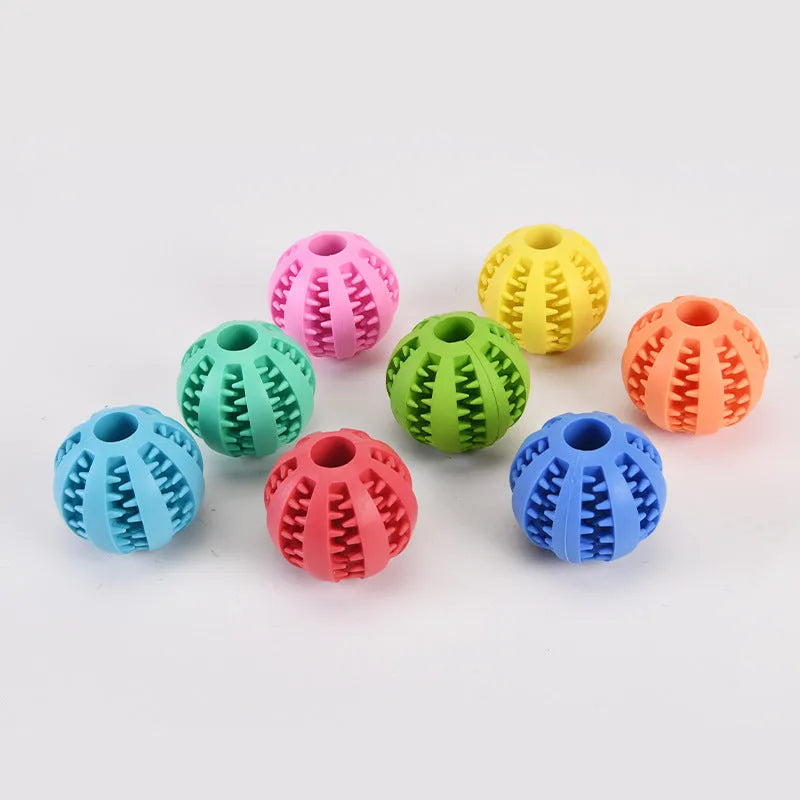 Small pink rubber dog chew toy with a 5 cm diameter for molar cleaning and self-entertainment