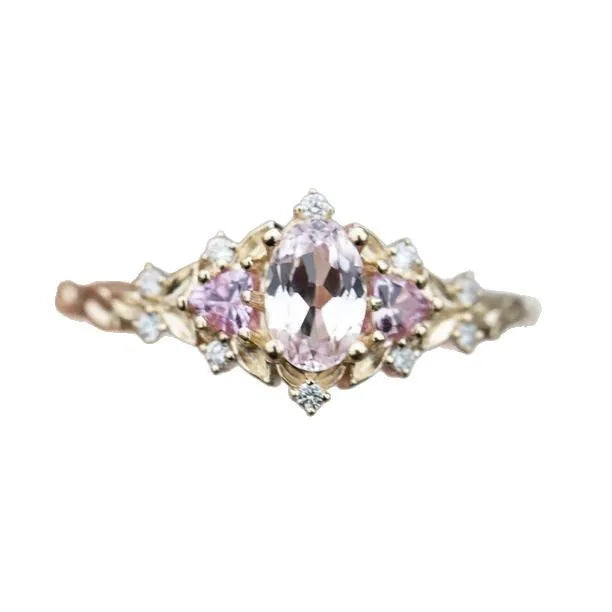 Women's alloy flower ring with inlaid zircon in gold pink diamond colour on white background
