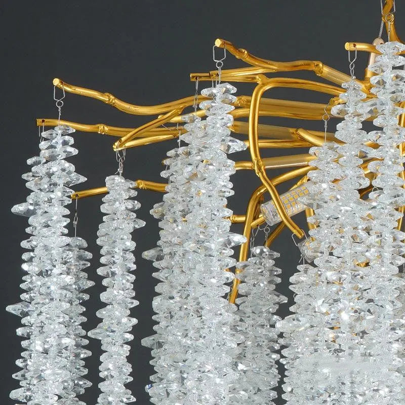 Aluminium alloy crystal chandelier light with adjustable height in round or long styles.