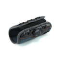 Black adjustable athletic wristguard with rotating pressure system on a flat surface