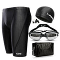 Men's complete swimming set showing briefs, anti-fog goggles, waterproof cap, ear plugs with nose clip, and swimming bag