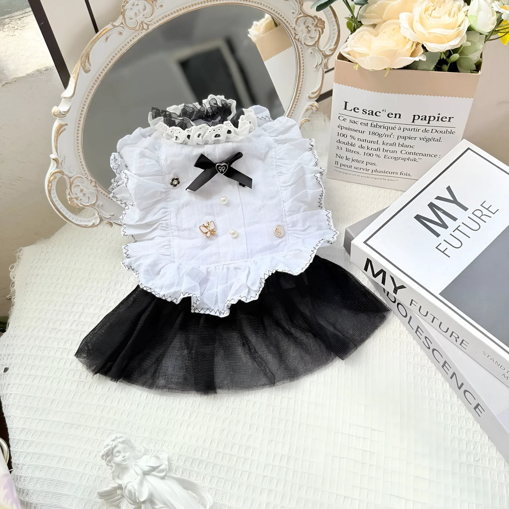 White polyester gauze princess-style skirt on a small dog, showing flowing design and fit.