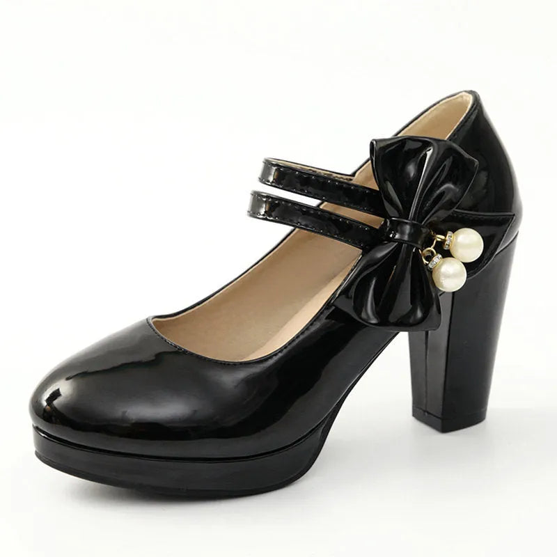 Red waterproof platform shoes with thick chunky heel, round toe, and ankle buckle.