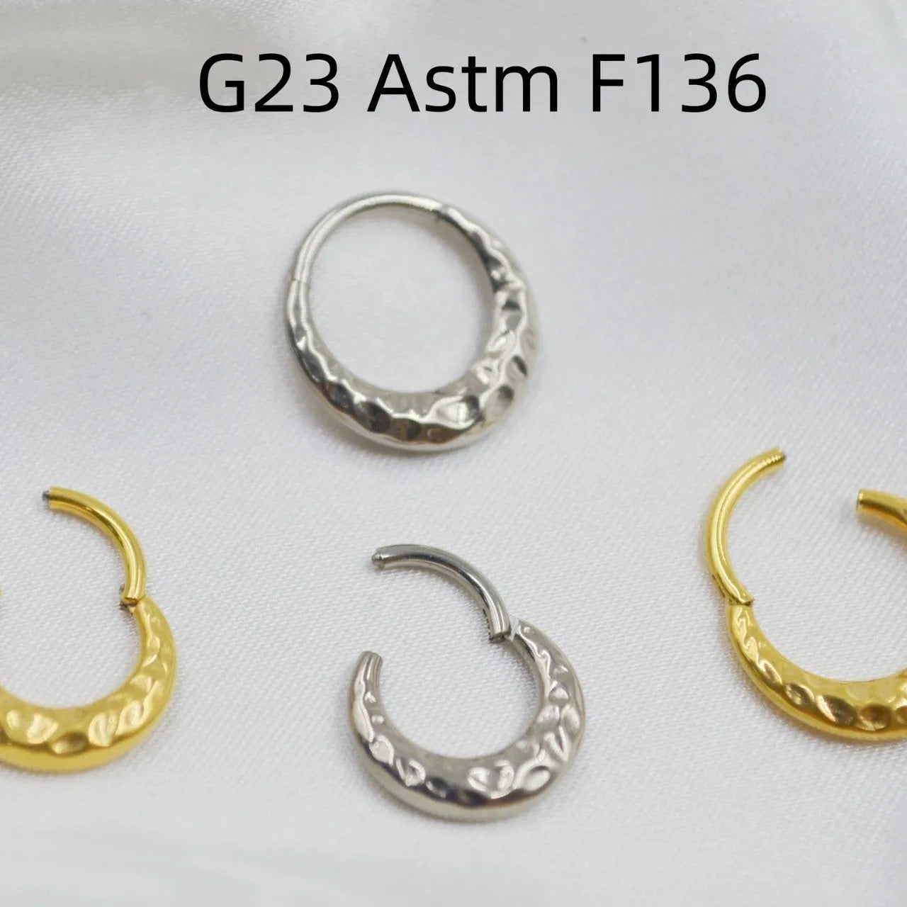 Titanium alloy concave-convex nose ring with carving detail in gold or silver colour, 1.2mm diameter