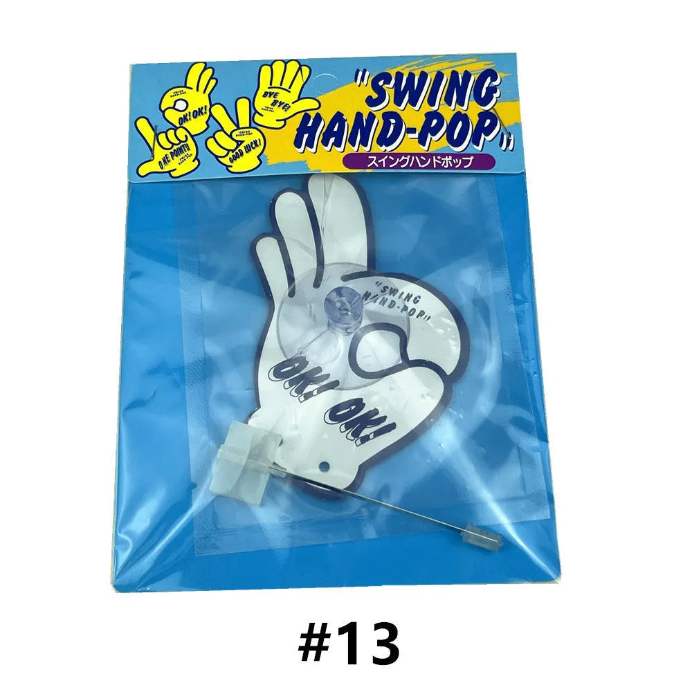 Cartoon swing hand aromatherapy pendant with jasmine green tea scent on its fixed mounting bracket.