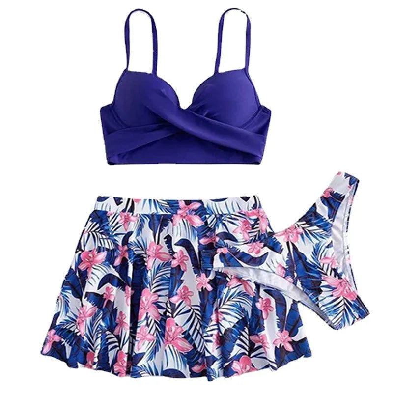 Women's high-waist bikini three-piece swimsuit in polyester fabric showing belly coverage design