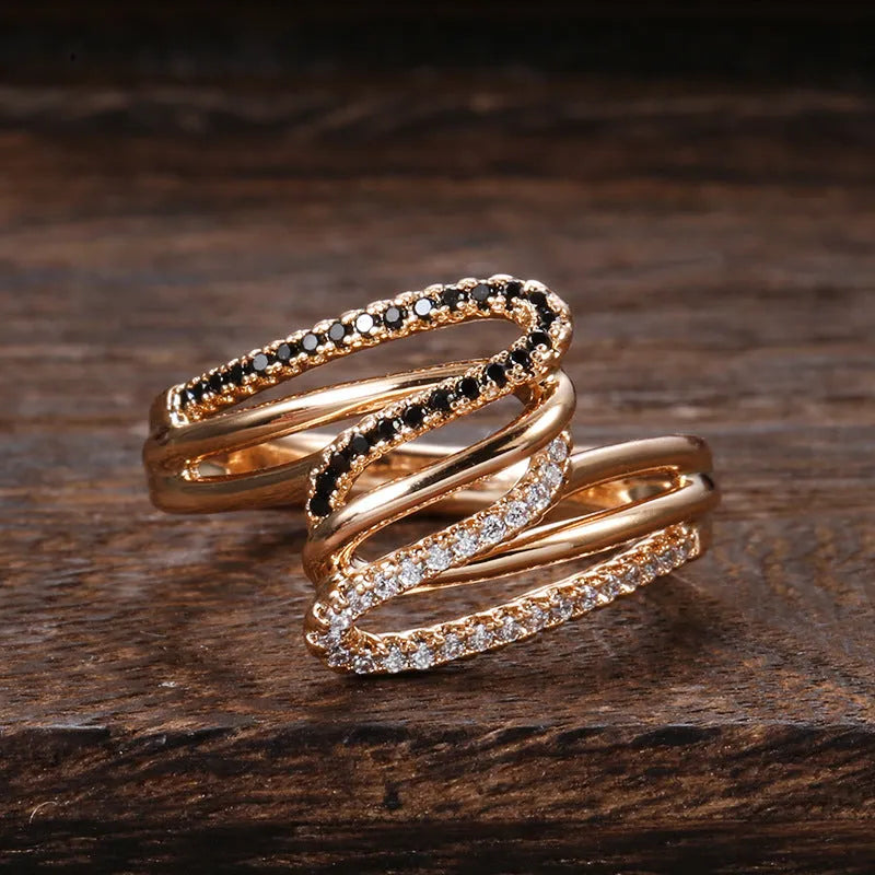 Women's copper ring with micro-inlaid zircon details in colour WK2230, shown on a hand.