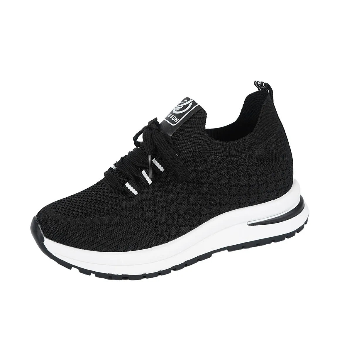 Women's black and white mesh platform sneakers with flat sole and lace-up front.
