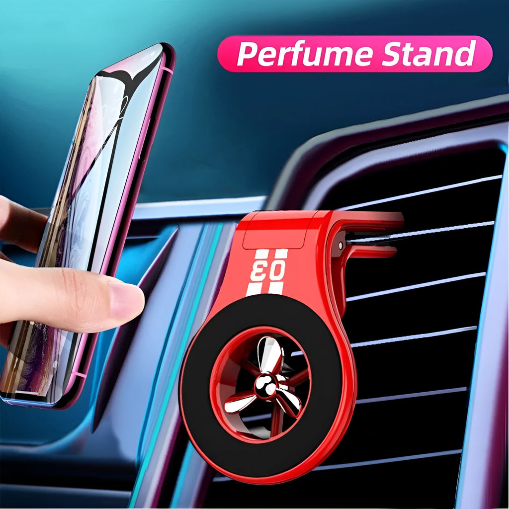 Black magnetic car phone holder mounted on a car air vent, showing 360-degree rotation and fragrance slot.