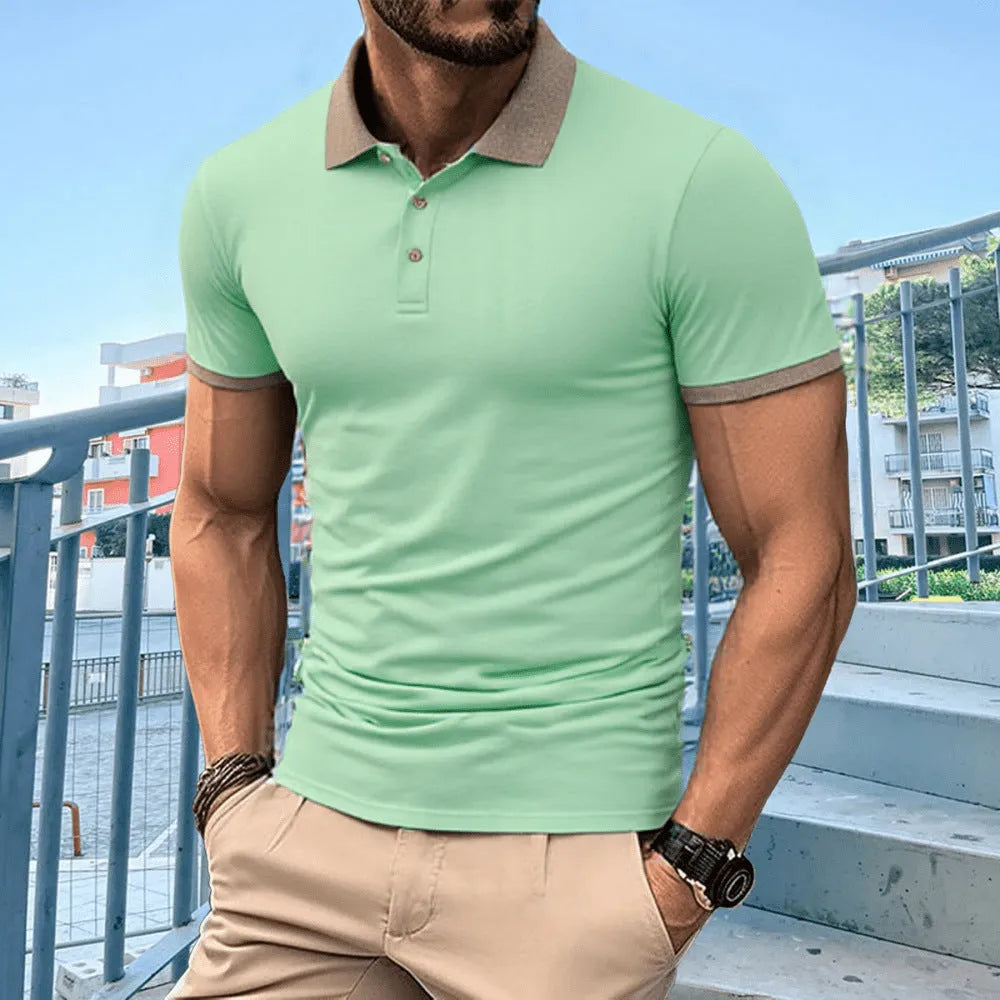 Men's green summer polo shirt with short sleeves and a black flocking design on the front.