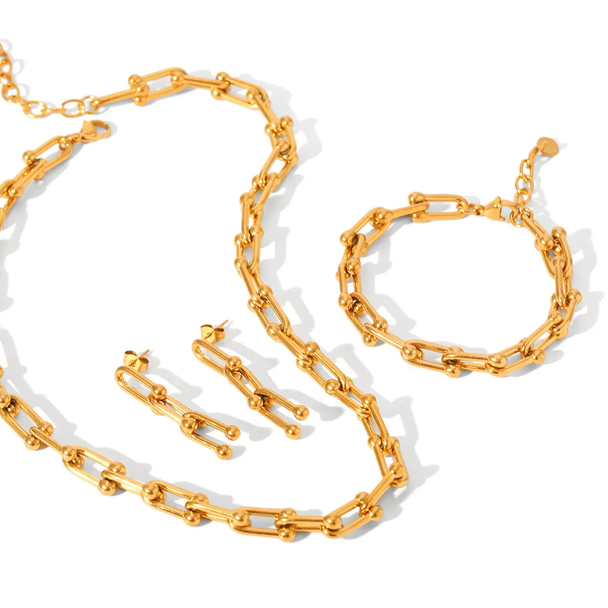Matching stainless steel necklace, bracelet, and earrings set with a titanium steel horseshoe charm.