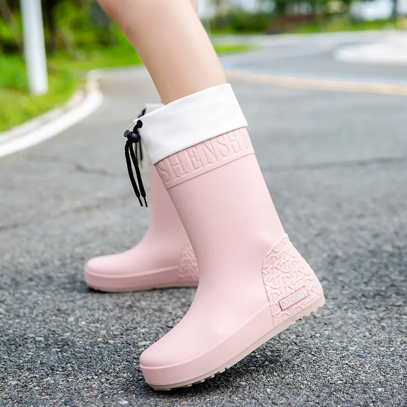 Women's solid colour rain boots with non-slip soles and waterproof mouth design in apricot, black, brown, or pink