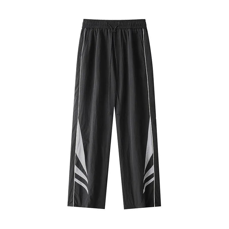 A pair of black straight-leg men's casual trousers on a hanger, showing the mid-rise waist and non-ironing fabric texture.
