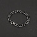 Silver titanium steel geometric minimalist cuff bracelet on flat surface showing 10mm width