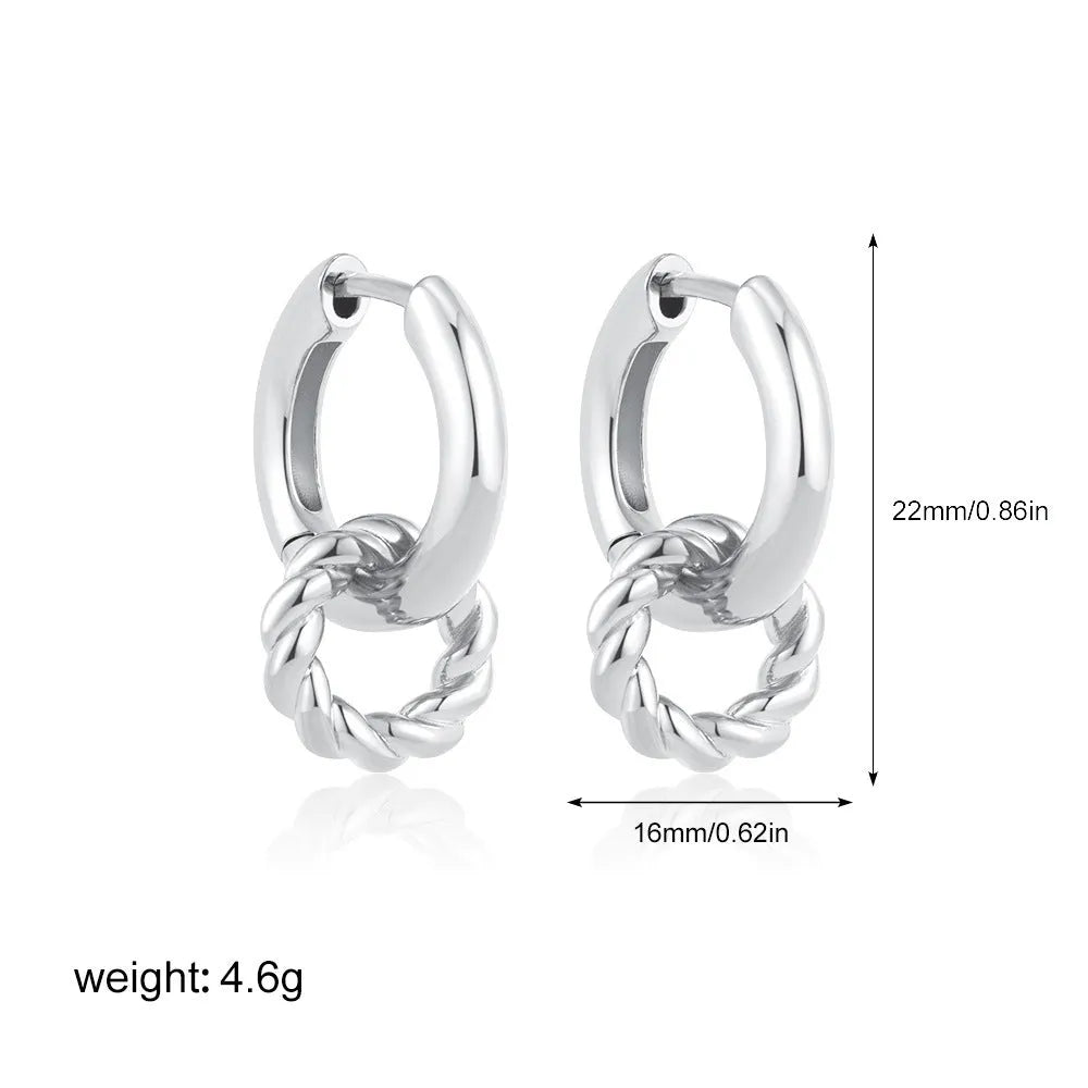 Double ring twist geometric square ear clip simple copper earrings on a neutral background