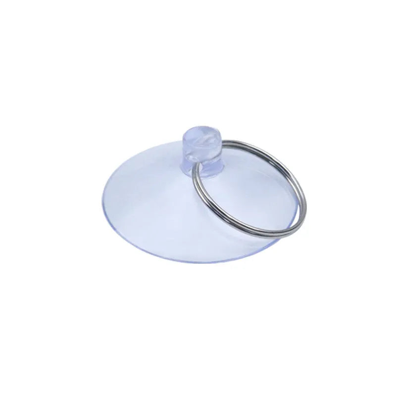 Twelve assorted PVC suction disc hooks in various sizes and styles on a white background