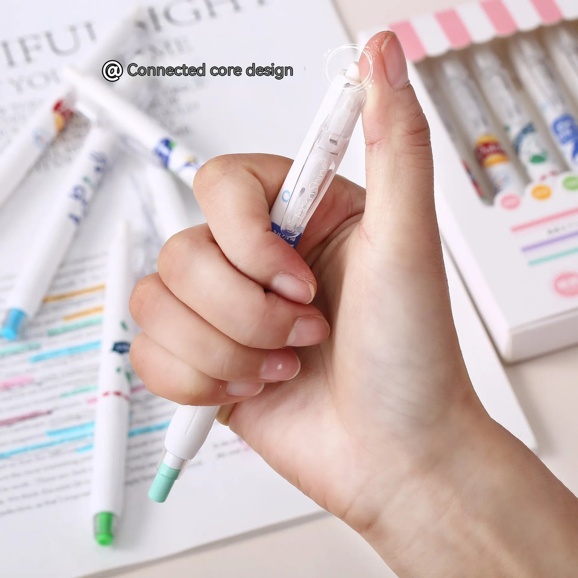 Six fluorescent highlighters in assorted neon colours with oblique tips in a cardboard box