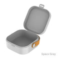 Medium-sized solid colour portable storage box for organising data cables and a Bluetooth headset.