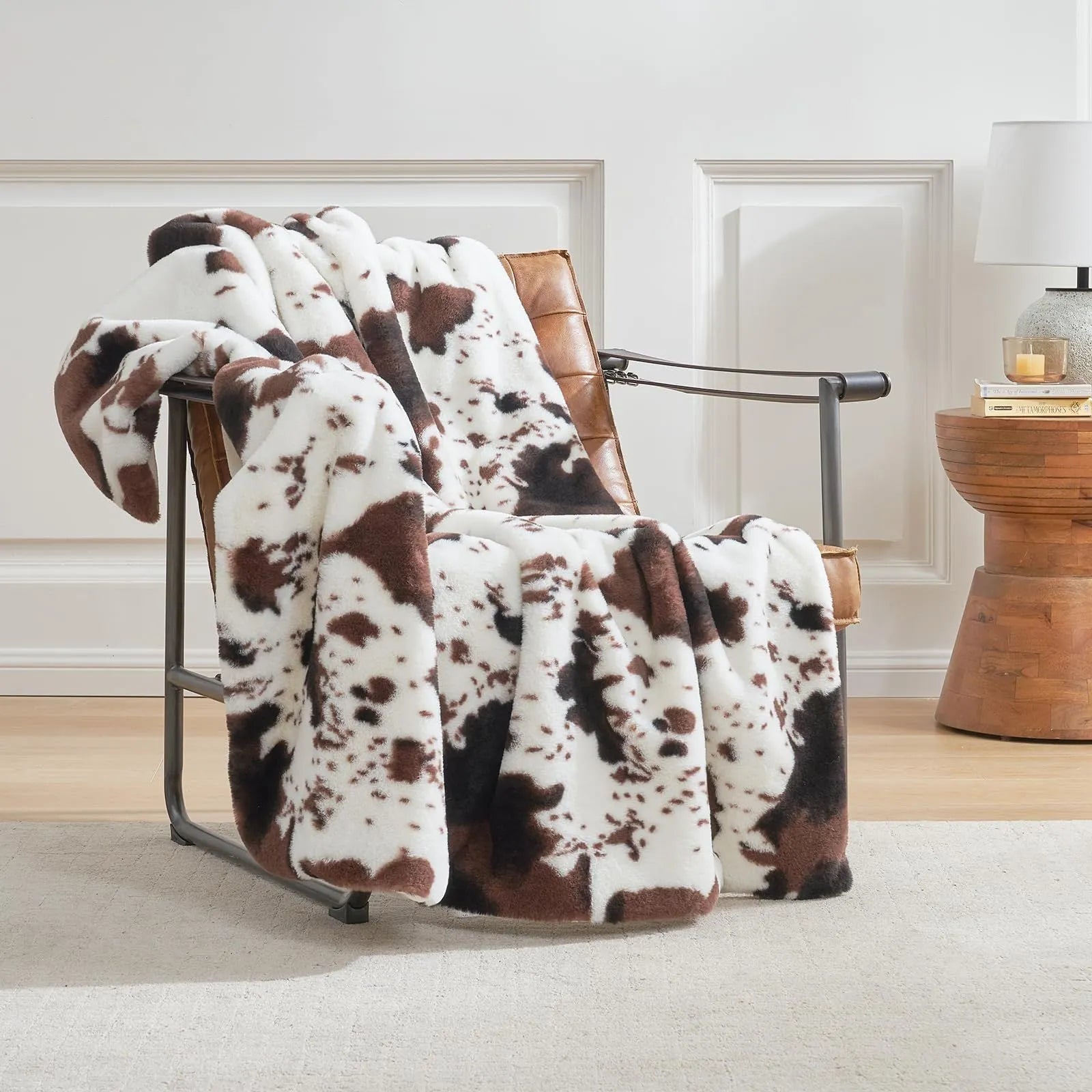 White flannel blanket with animal stripe pattern on a sofa