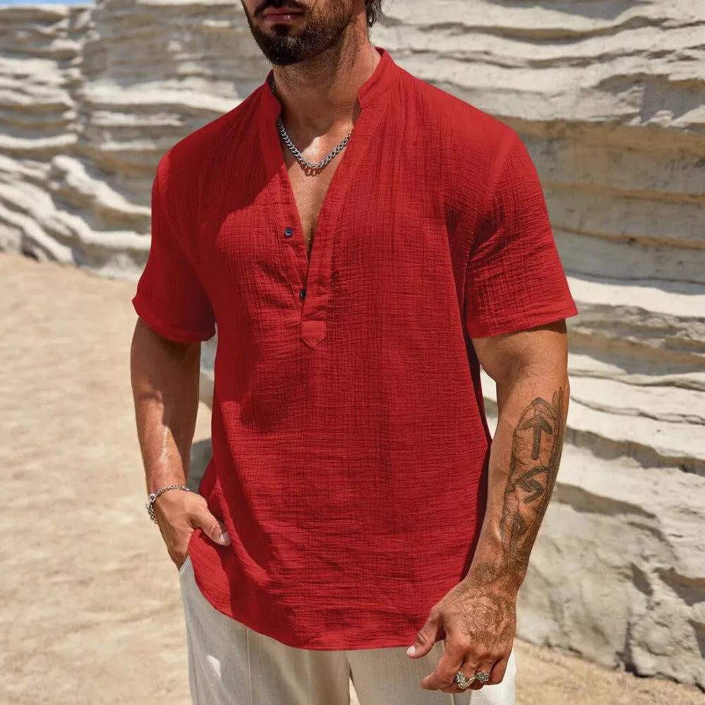 Men's solid colour short-sleeve casual shirt with stand collar on a hanger.