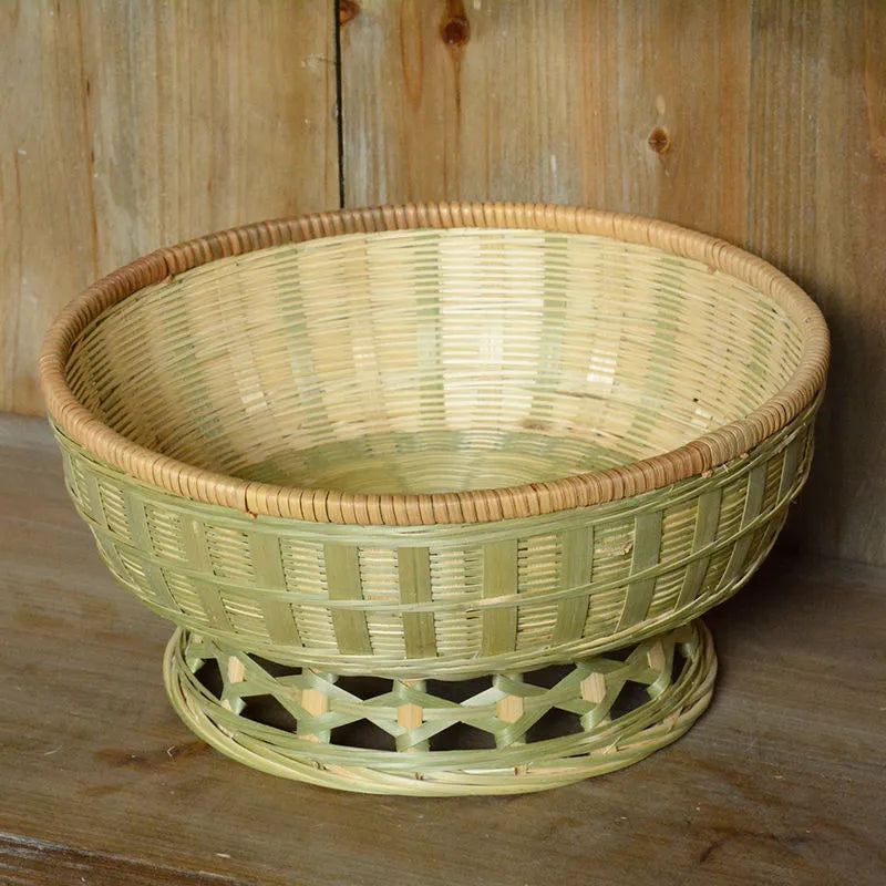 Handmade natural bamboo storage basket with open weave design in three size variations