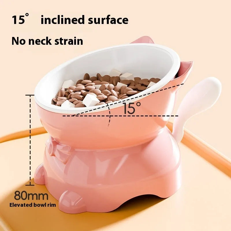 Stainless steel cat bowl with a slanted black base, showing its wide, shallow food dish.