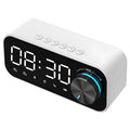 Bluetooth alarm clock speaker with LED digital display, dual alarm, and night light in plastic housing