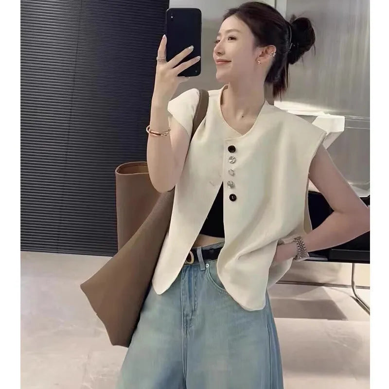 Women's sleeveless polyester vest in milky white with loose fit and pocket details