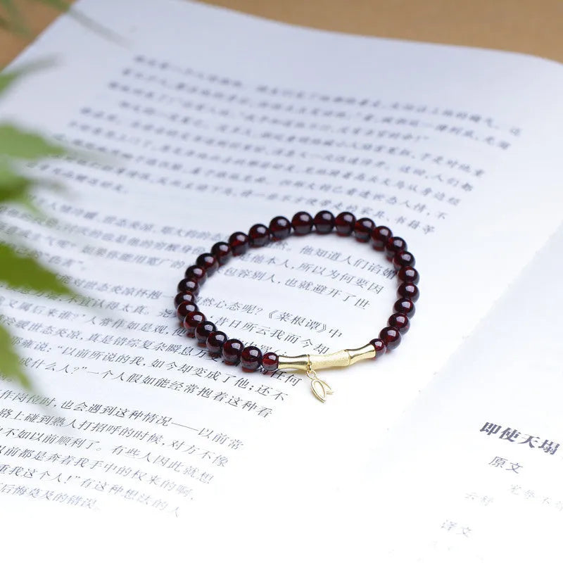 Handmade natural garnet bamboo joint bracelet in copper or silver finish, 6mm bead size.