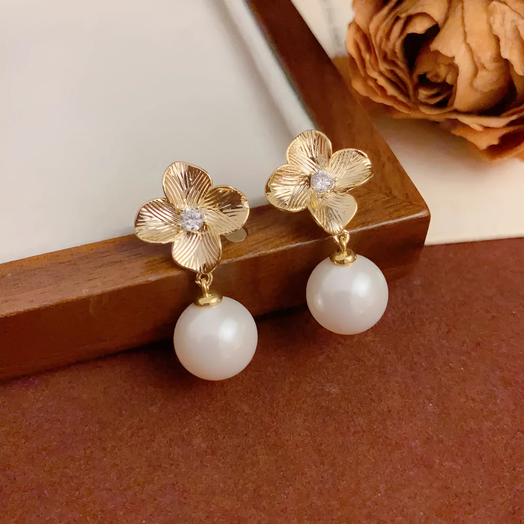 Women's gold plated copper floral drop earrings with faux pearl and metal petals simple style