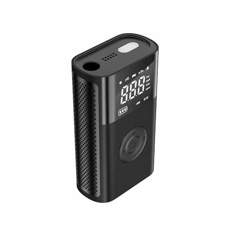 Black handheld wireless digital tyre inflator with LCD screen, showing pressure reading, with accessory nozzles