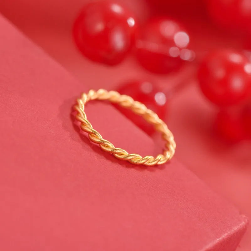 Women's brass gold plated ring showing simple bracelet and twist design options in glossy and matte finishes