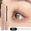 Black women's curly long mascara tube with brush, 14cm height, for lash volumising and definition