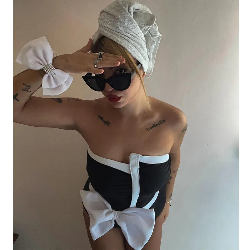 Black and white colour-blocking women's swimsuit with bow detail and irregular tube top
