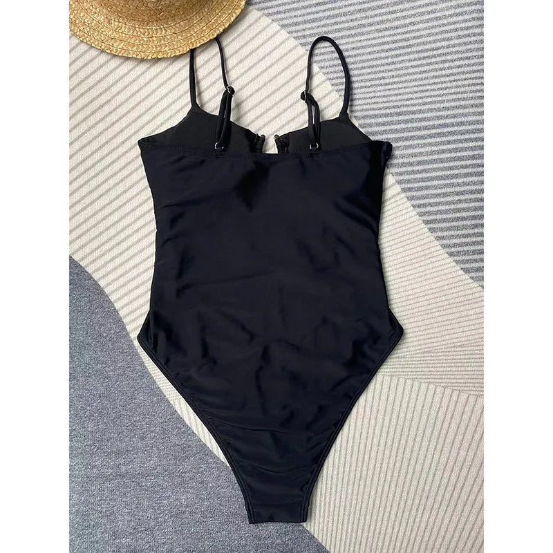 Solid black one-piece swimsuit for women on a mannequin.