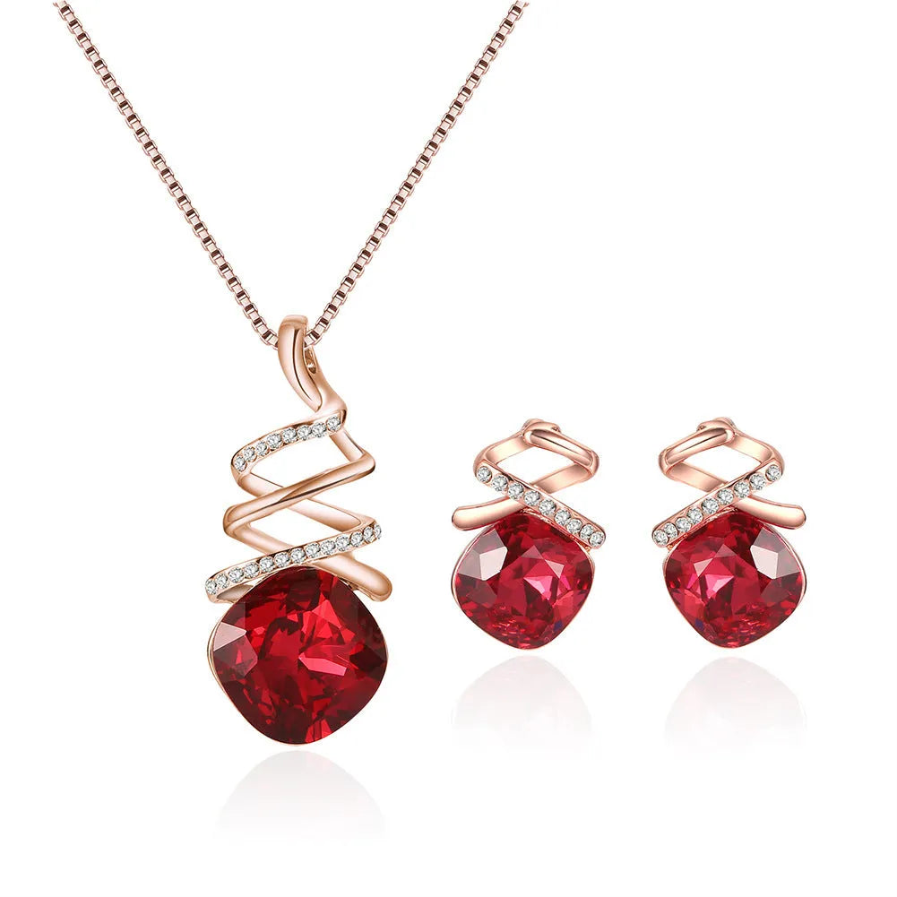 Women's alloy necklace and earring set with water wave chain and diamond-like detail on a white background.