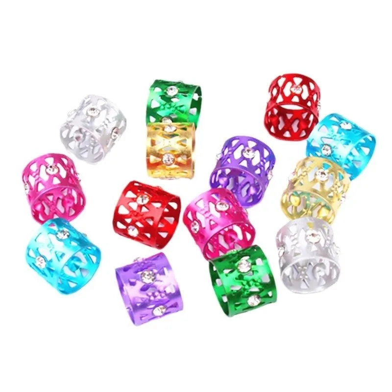 Aluminium hair ring wig decoration with hollow jewelled design and crown motif in multiple colour options.