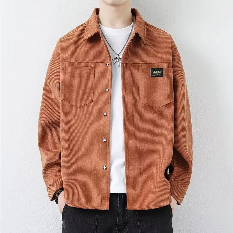 Men's black corduroy cardigan jacket with long sleeves on a hanger.