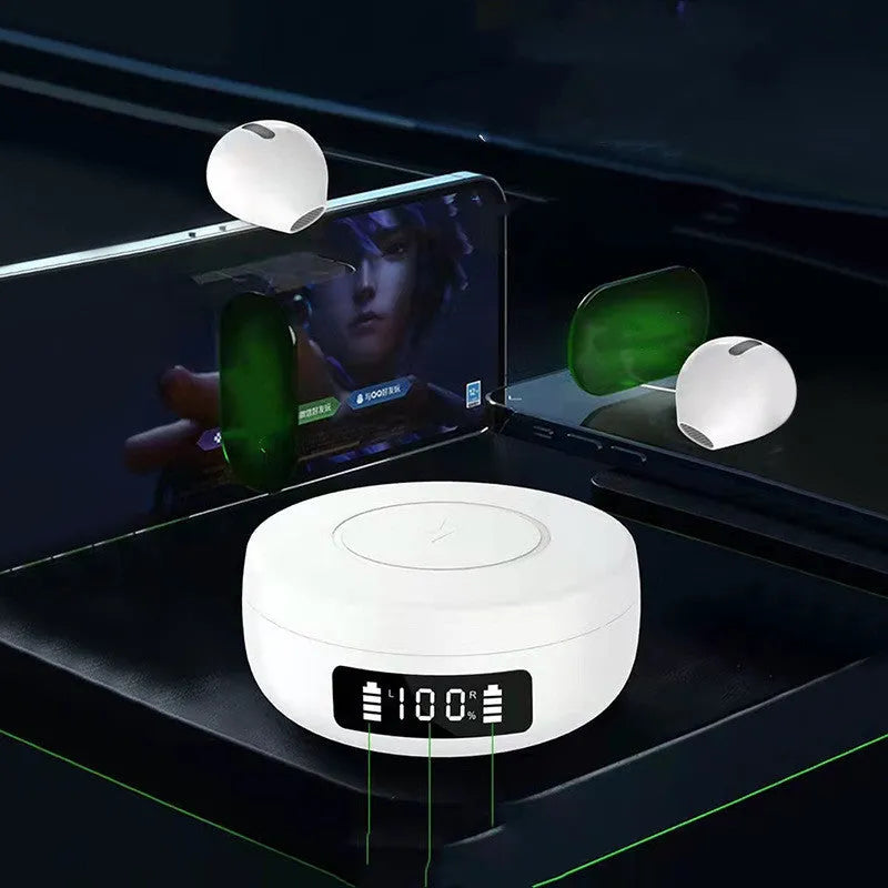 Pair of small black semi-in-ear wireless headphones sitting inside a white charging compartment with lid open.