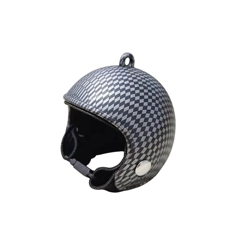 Small plastic chicken pet helmet in one of twelve designs including rainbow, plaid, or smiling face.