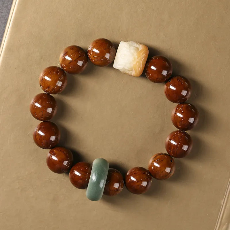 Hand-woven Buddhist prayer bracelet with 13mm round beads in ivory nut, bodhi, or sandalwood lion style